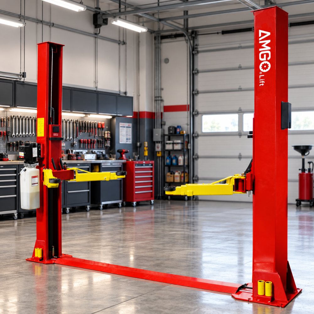 AMGO BP-9 Base Plate Two-Post Lift installed in a professional automotive garage with red columns and yellow lifting arms