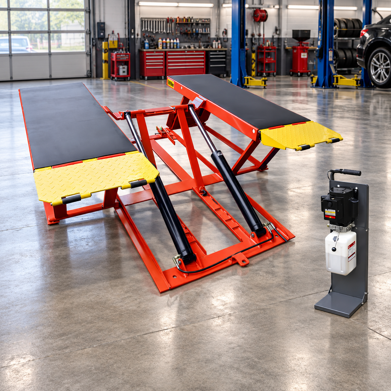 AMGO LR10 Portable Low-Rise Lift displayed in a professional automotive garage