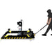 AMGO MR06 Portable Mid-Rise Scissor Lift shown being pulled with its portable moving dolly