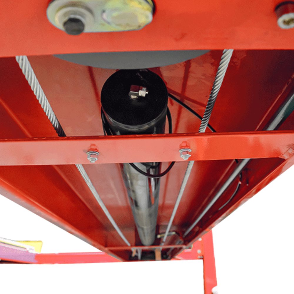 AMGO PRO-12SX Four-Post Lift hydraulic cylinder and cable system viewed beneath the runway