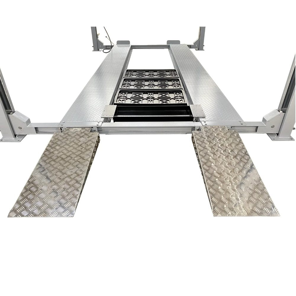 Triumph NSS-11 Four-Post Lift close-up showing the aluminium approach ramps and runways