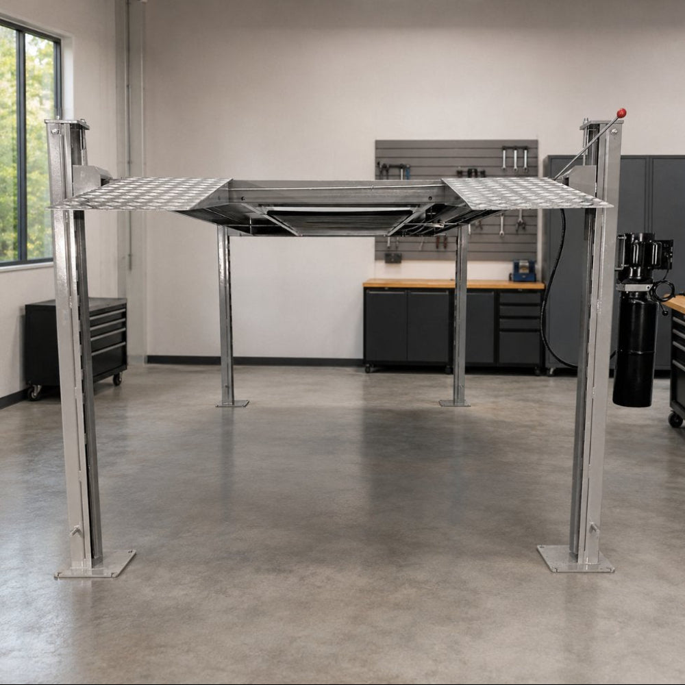 Triumph NSS-8 8,000 lb Four-Post Car Lift Raised in Garage