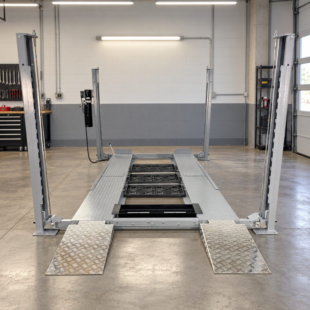 Triumph NSS8X-1 Four-Post Lift front view with aluminum ramps in a garage