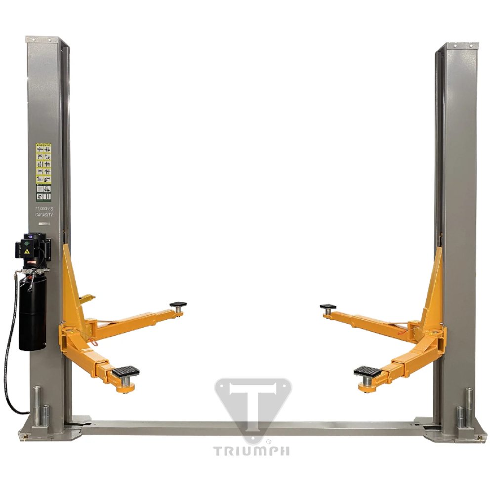 Triumph NT-11 Two-Post Auto Lift front view with floor plate and orange lifting arms