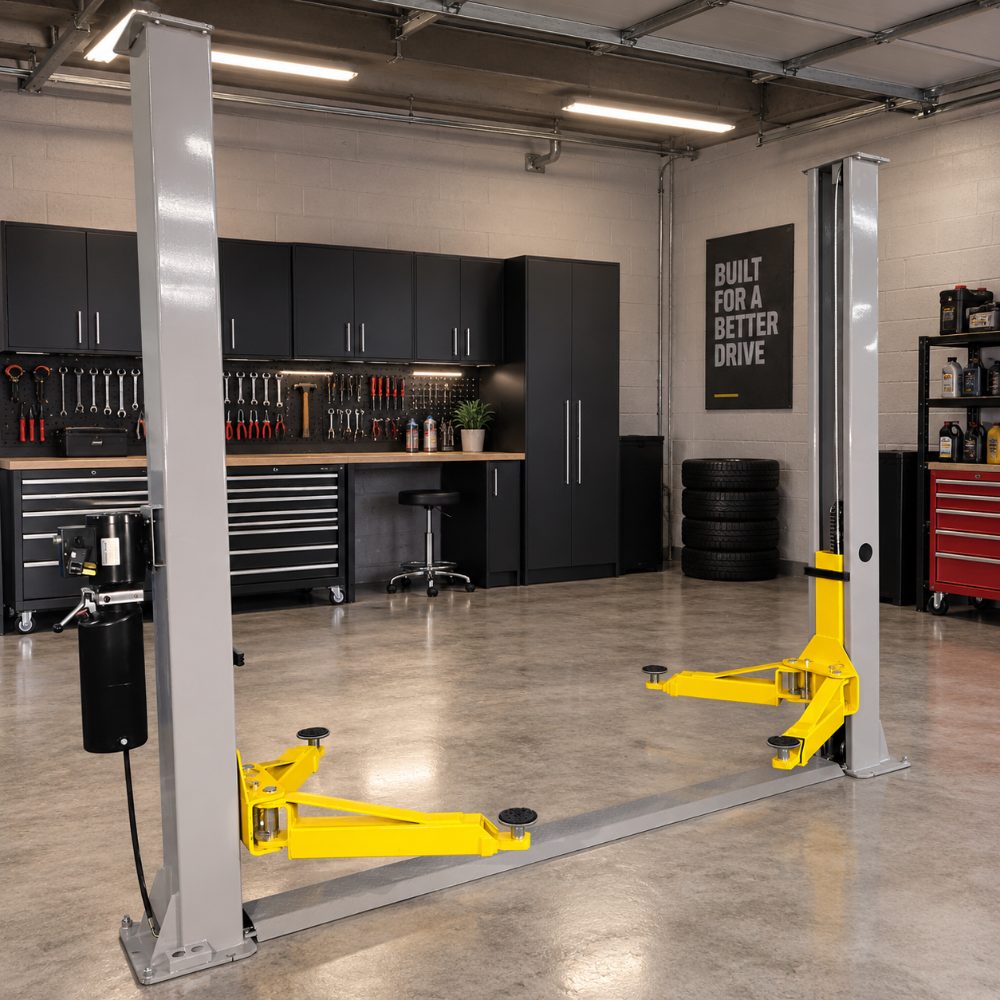 Triumph NT-9 Two-Post Floor Plate Lift installed in a professional garage with yellow lifting arms