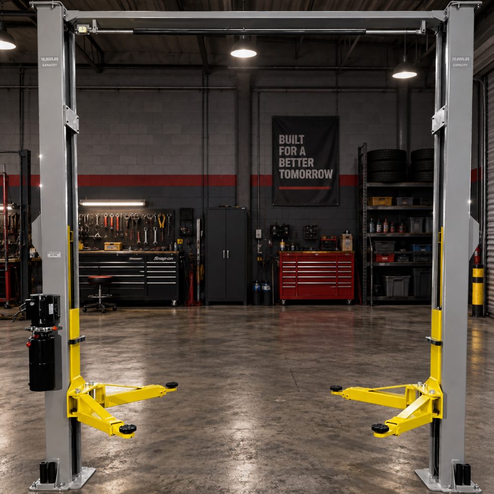 Triumph NTO-10A Overhead Two-Post Lift displayed in a dark automotive workshop