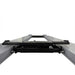 Triumph RJ-5000 5,000 lb Rolling Bridge Jack fully lowered between four-post lift runways