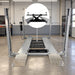 Triumph RJ-5000 5,000 lb Rolling Bridge Jack installed between the runways of a four-post car lift