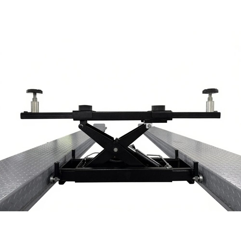 Triumph RJ-5000 5,000 lb Rolling Bridge Jack raised between lift runways with adjustable lifting pads